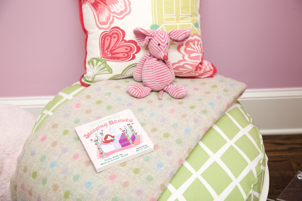 Design ideas for a mid-sized transitional kids' bedroom for kids 4-10 years old and girls in Atlanta with dark hardwood floors and pink walls.