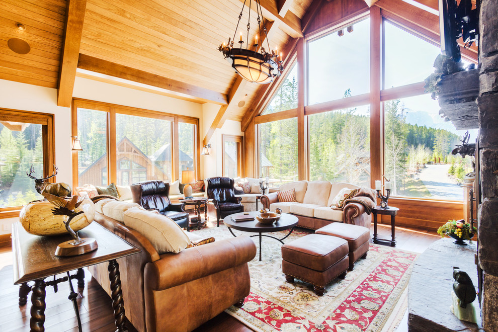 Example of a mountain style home design design in Calgary