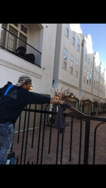 Wrought Iron Fence Renewed & Repainted.