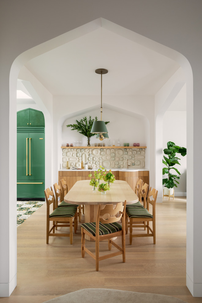 Great room - contemporary light wood floor and brown floor great room idea in San Francisco with white walls
