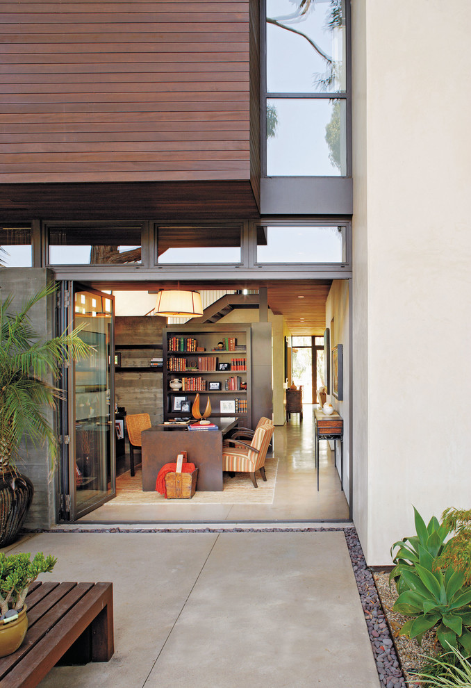 Design ideas for a contemporary exterior in Los Angeles with wood siding.