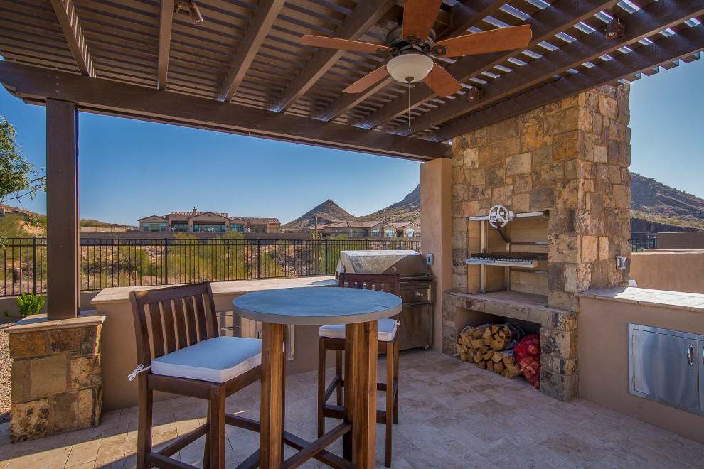 Example of a mountain style patio design in Phoenix
