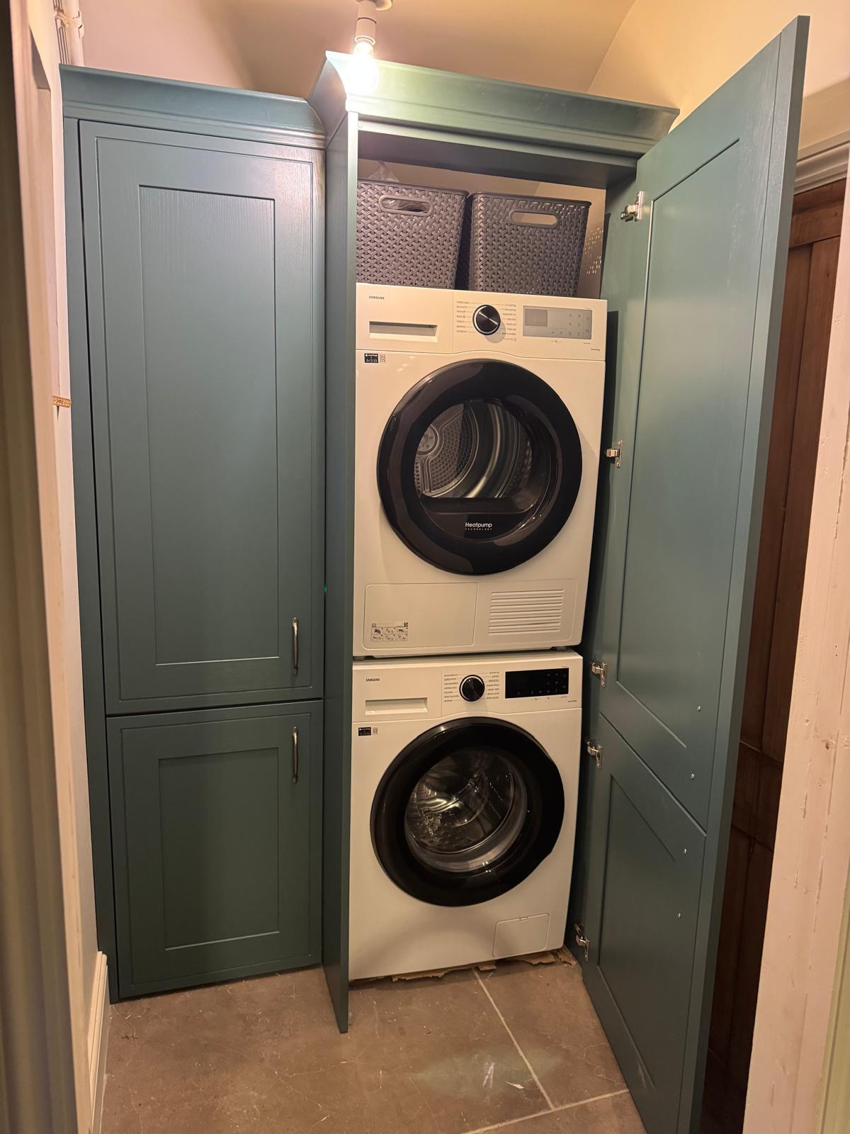A Dark Coloured Gally Kitchen