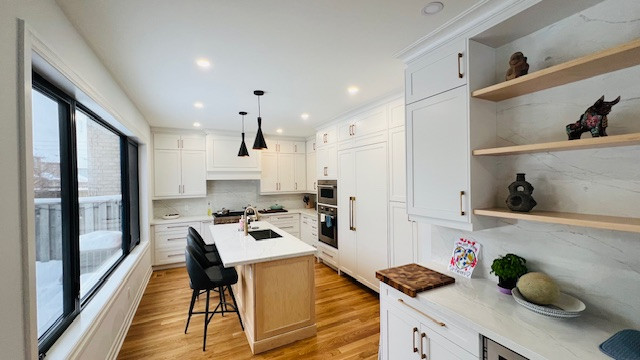 Main Floor with large window & patio door include an open concept kitchen