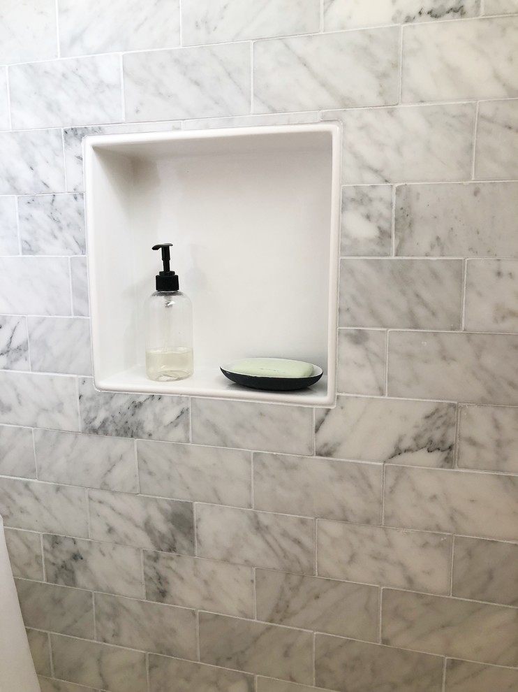 Small transitional master gray tile and marble tile marble floor and gray floor alcove shower photo in Providence with furniture-like cabinets, white cabinets, white walls, an undermount sink, marble countertops and white countertops