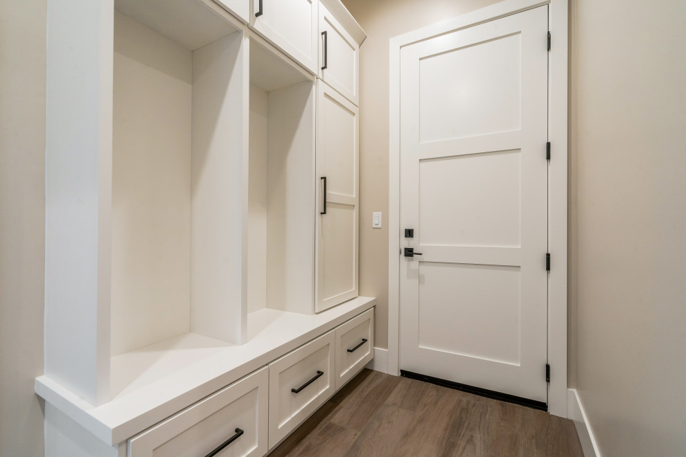 Mid-sized minimalist ceramic tile mudroom photo in Phoenix