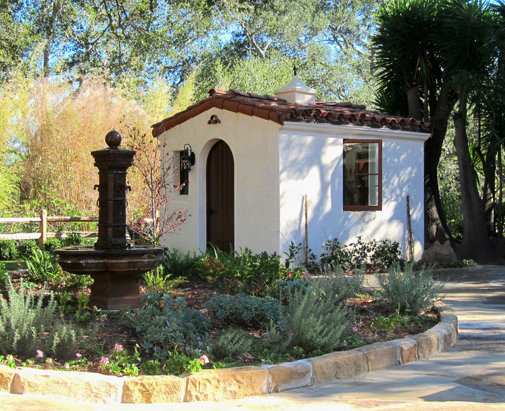 Garden shed - small mediterranean detached garden shed idea in Santa Barbara