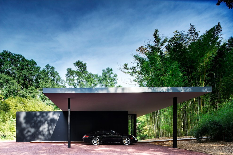Photo of a modern detached carport in New York.