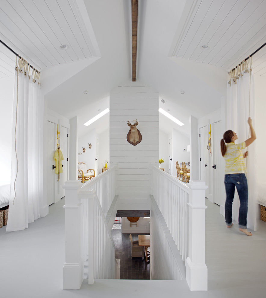 Photo of a mid-sized beach style hallway in Atlanta with white walls.