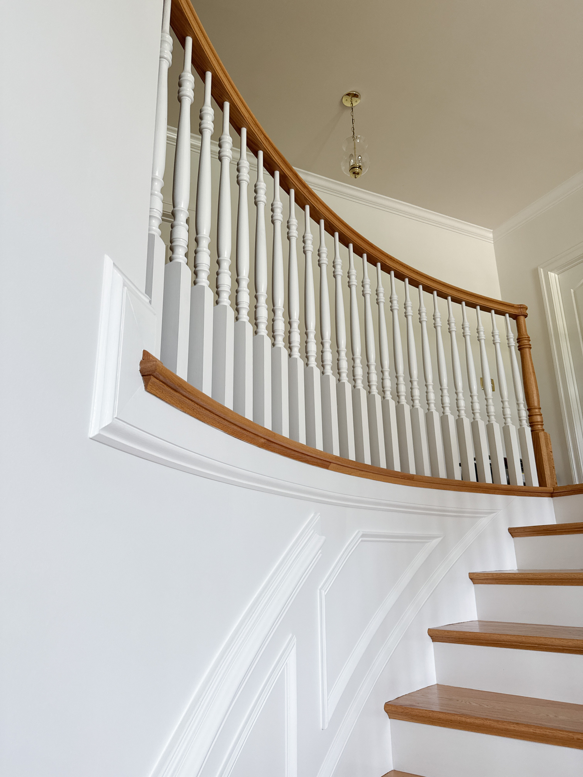 Project #161 | Curved Red Oak Foyer Staircase, 26 Years Later