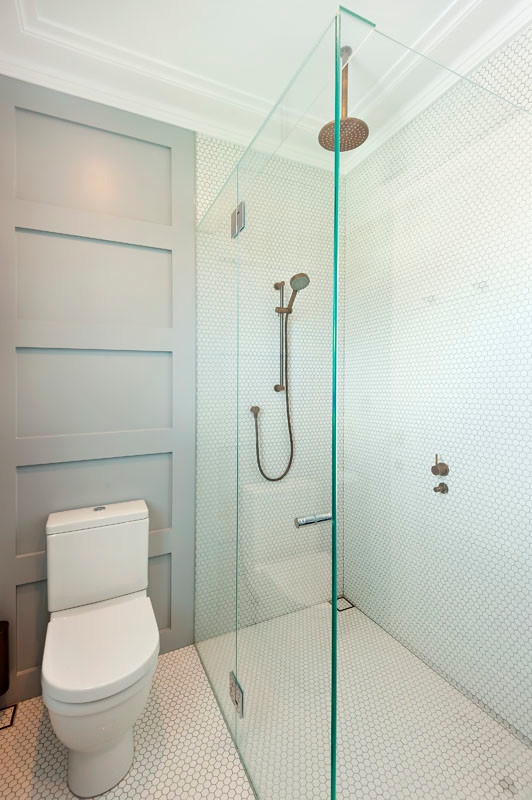 Design ideas for a contemporary bathroom in Sydney with white tile and mosaic tile.
