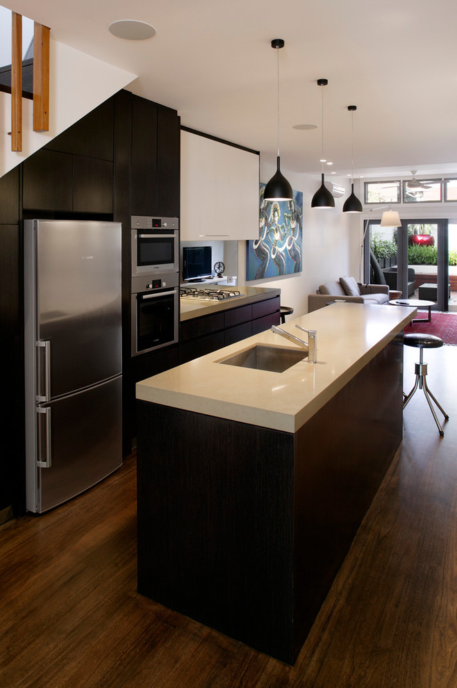 Photo of a small contemporary galley eat-in kitchen in Sydney.