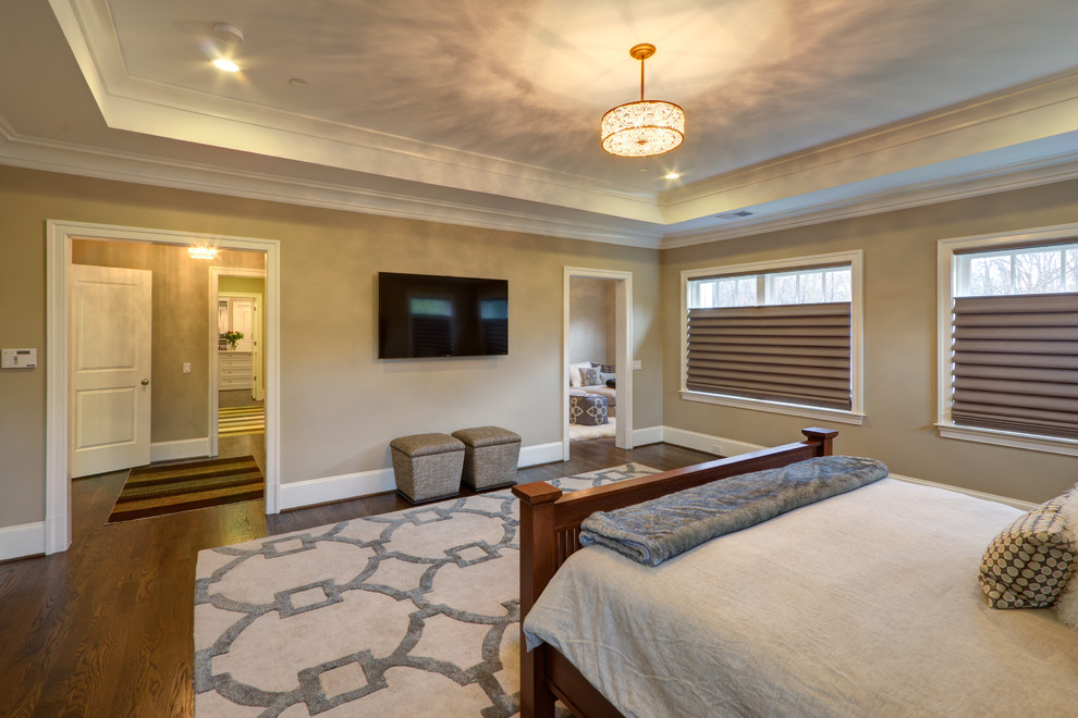 Inspiration for a transitional master medium tone wood floor bedroom remodel in DC Metro with gray walls and no fireplace