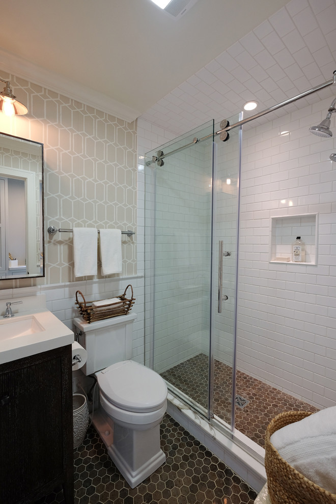 Small transitional 3/4 bathroom in Chicago with dark wood cabinets, engineered quartz benchtops, white tile, beige walls, furniture-like cabinets, an alcove shower, ceramic tile, ceramic floors, a two-piece toilet and an undermount sink.