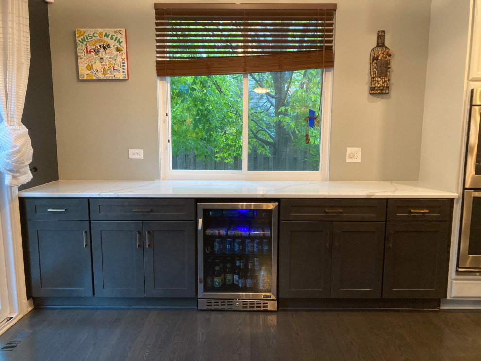 Example of a small transitional single-wall kitchen design in Chicago with shaker cabinets, gray cabinets and quartz countertops