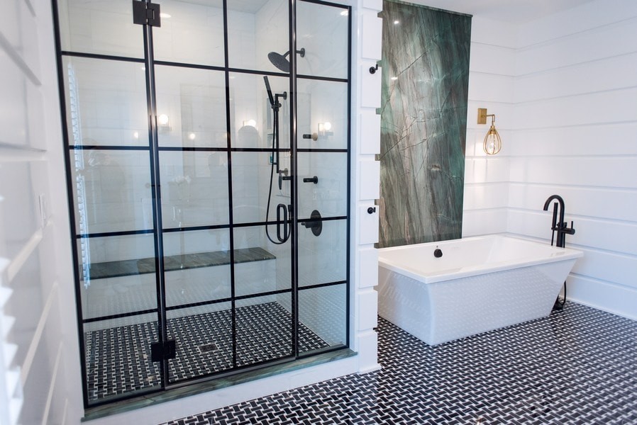Photo of a mid-sized contemporary master bathroom in Chicago with a freestanding tub, an alcove shower, white walls and a hinged shower door.