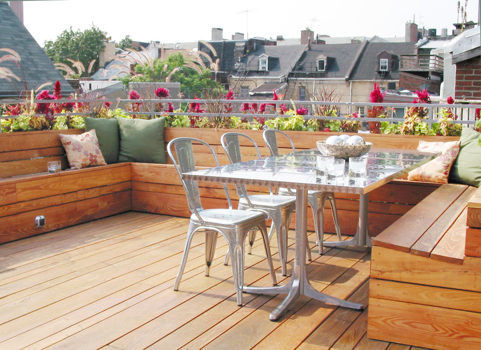This is an example of a mid-sized modern rooftop deck in Philadelphia with no cover.