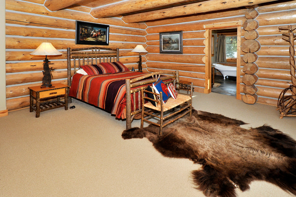 Inspiration for a large rustic master carpeted bedroom remodel