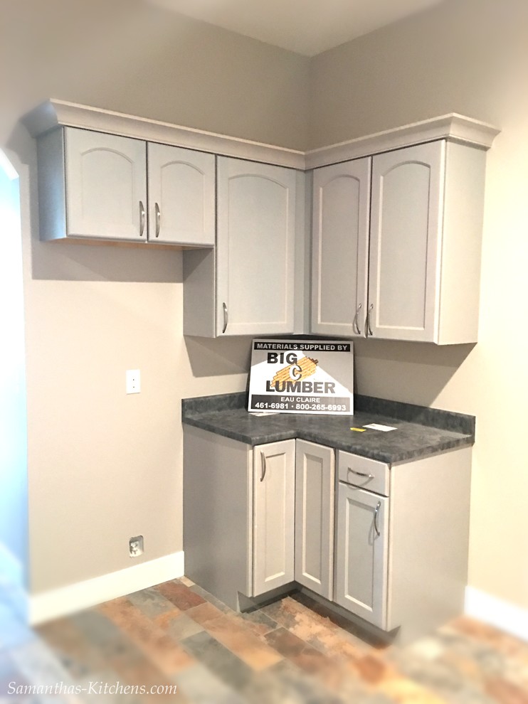 Inspiration for a mid-sized transitional porcelain tile home design remodel with beige walls