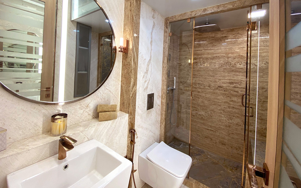 Photo of a mid-sized contemporary bathroom in London with glass-front cabinets, a curbless shower, a one-piece toilet, beige tile, stone slab, white walls, marble floors, an undermount sink, grey floor, a hinged shower door, beige benchtops, a single vanity, a built-in vanity and timber.