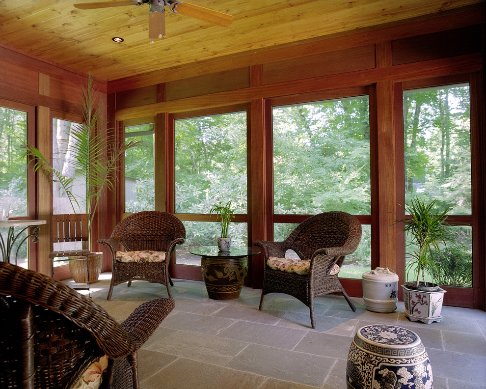 Mid-sized trendy tile screened-in back porch idea in New York with a roof extension