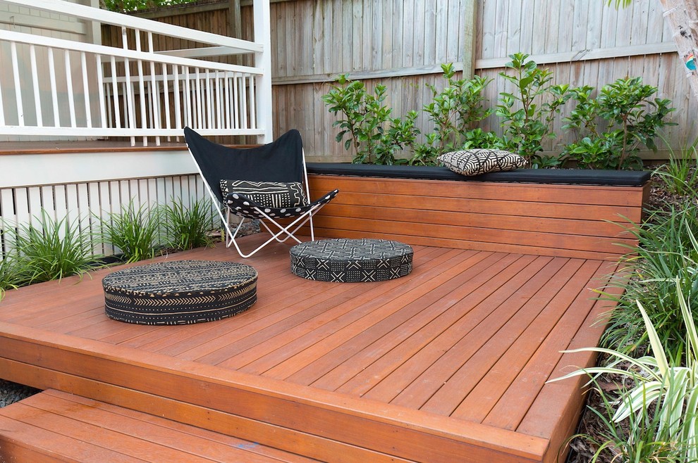 Inspiration for a contemporary front yard garden in Brisbane with decking.