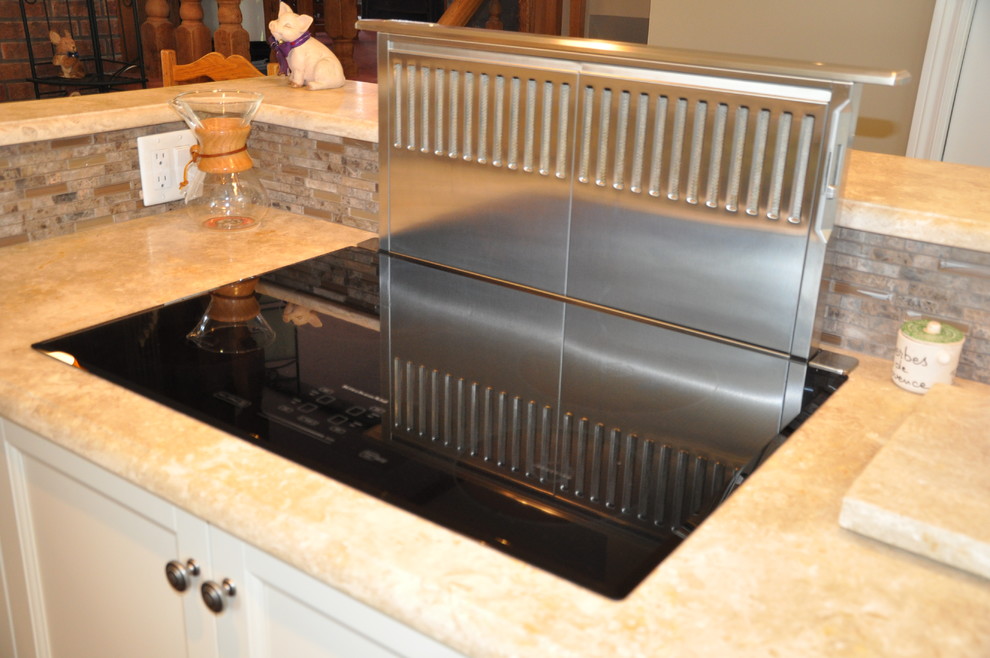 Large mountain style single-wall dark wood floor eat-in kitchen photo in Ottawa with an undermount sink, shaker cabinets, beige cabinets, granite countertops, brown backsplash, stone tile backsplash, stainless steel appliances and an island