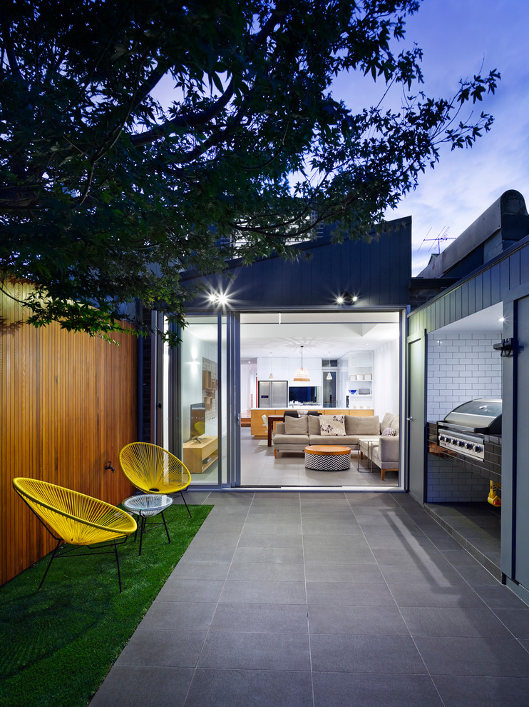 Small contemporary backyard patio in Sydney with no cover.