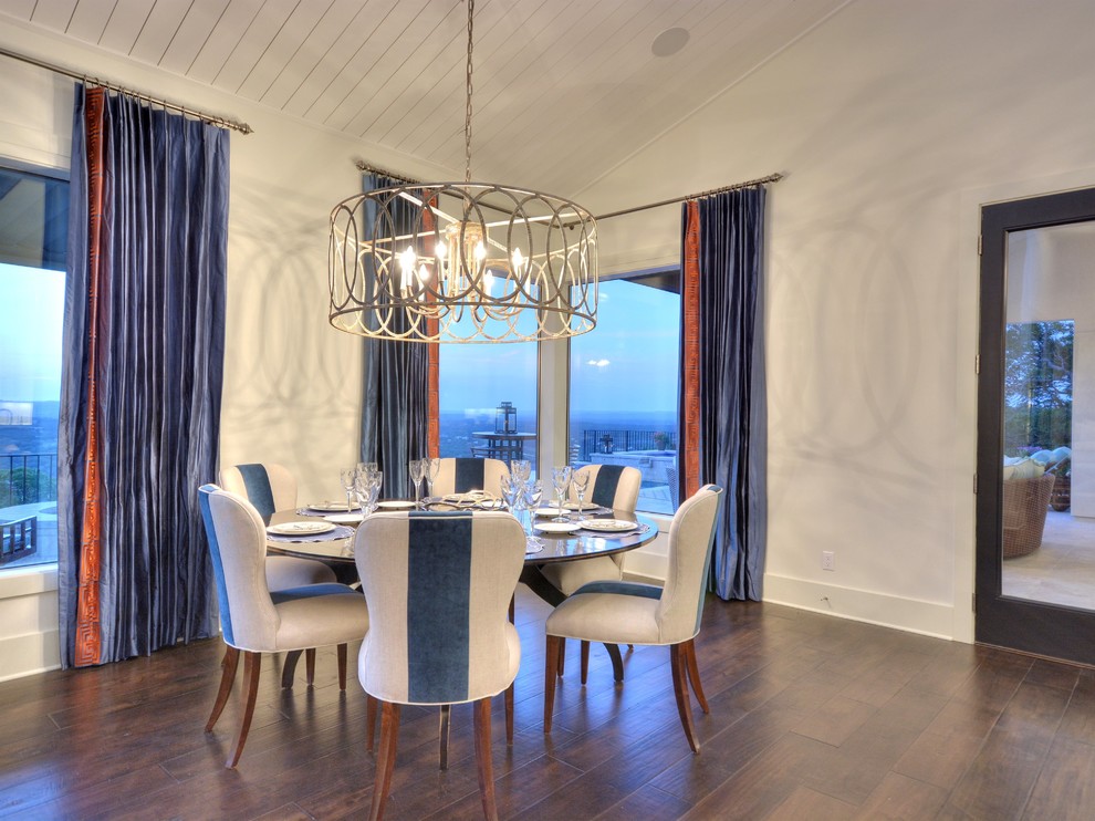 Transitional dining room in Austin.