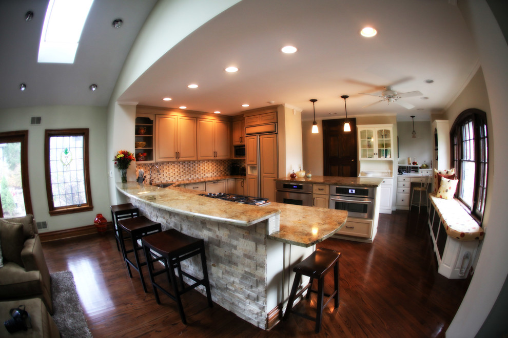Example of a small transitional dark wood floor kitchen design with an undermount sink, raised-panel cabinets, white cabinets, granite countertops, multicolored backsplash, ceramic backsplash and paneled appliances