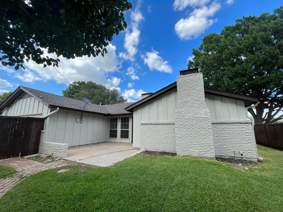 Mid-sized transitional beige one-story mixed siding and board and batten gable roof photo in Dallas with a shingle roof and a brown roof