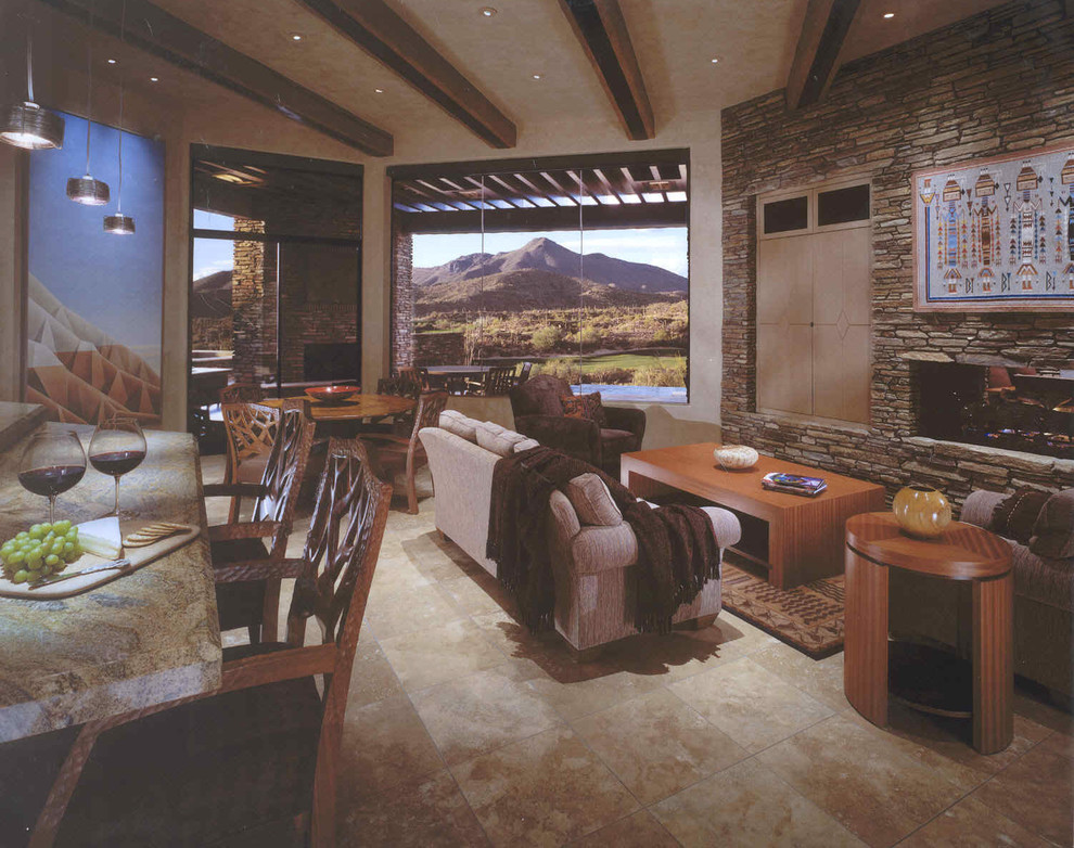 Mid-sized open concept family room in Phoenix with beige walls, travertine floors, a concealed tv and a standard fireplace.