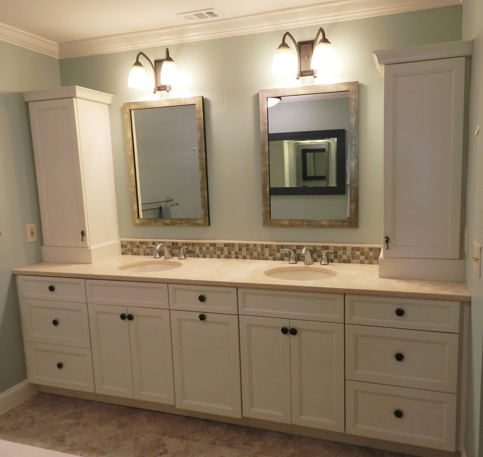 Photo of a mid-sized traditional master bathroom in Jacksonville with an undermount sink, shaker cabinets, white cabinets, limestone benchtops, a corner tub, an alcove shower, a one-piece toilet, beige tile, porcelain tile, blue walls and porcelain floors.