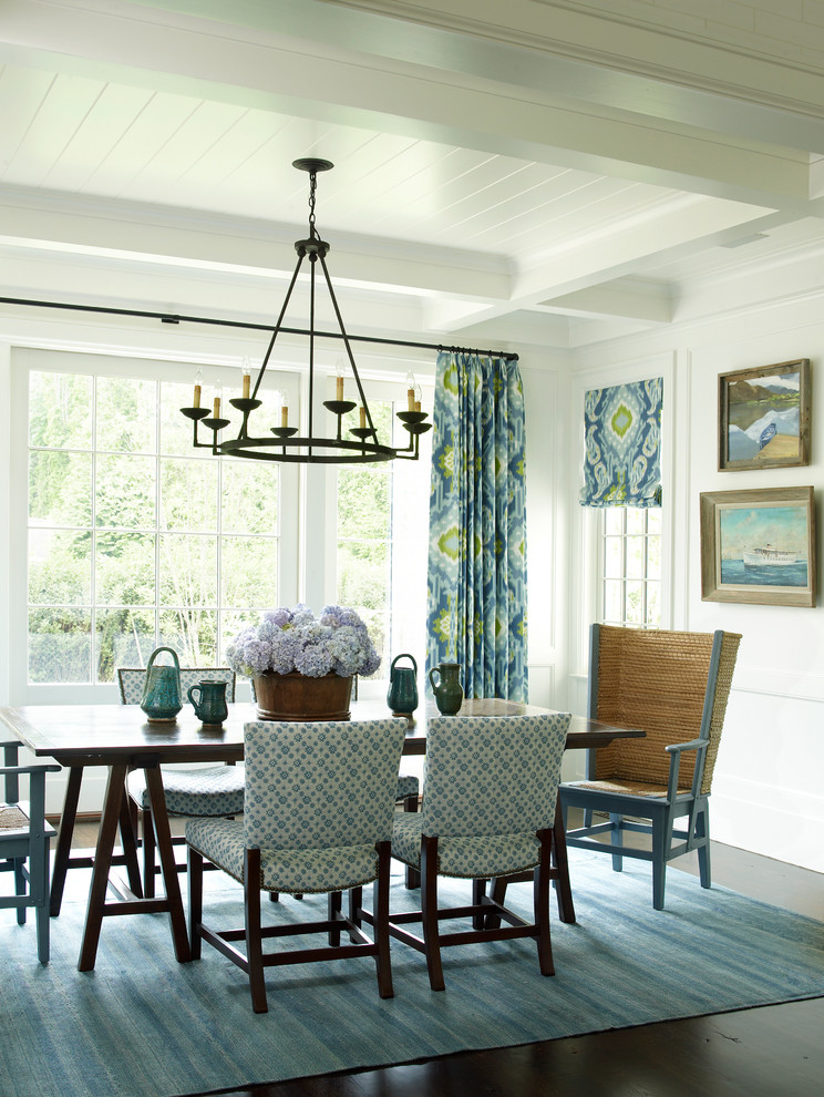 Enclosed dining room - large dark wood floor enclosed dining room idea in New York with white walls