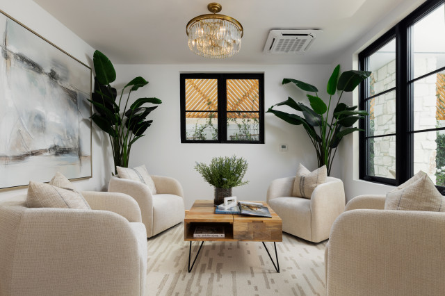 Coastal Living Room with Marble Fireplace contemporary-living-room
