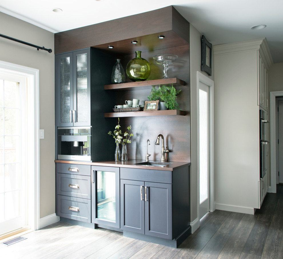 Kitchen - l-shaped gray floor kitchen idea with a farmhouse sink, blue cabinets, quartz countertops, beige backsplash, ceramic backsplash, stainless steel appliances and an island