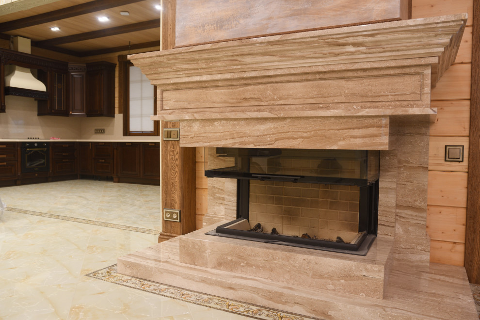 Монтаж дровяного камина с мраморной облицовкой