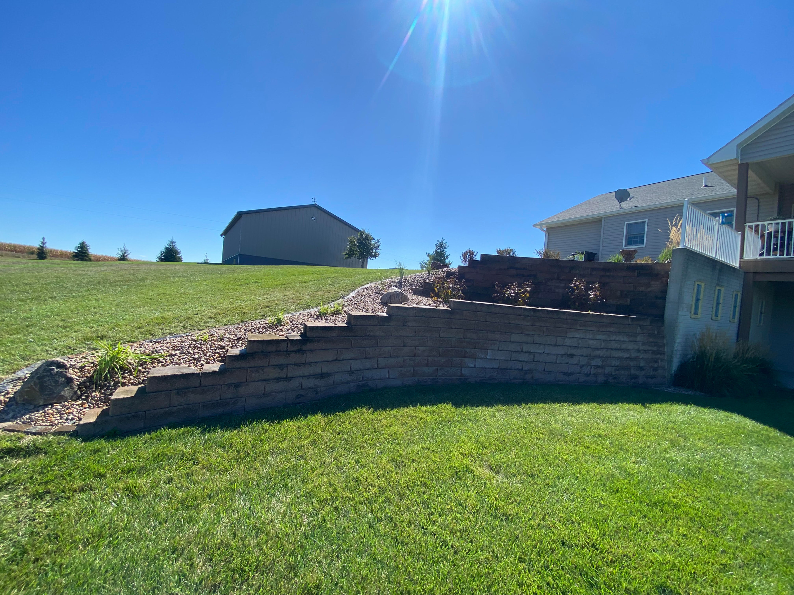 Upper Wall Rebuild & Softscaping