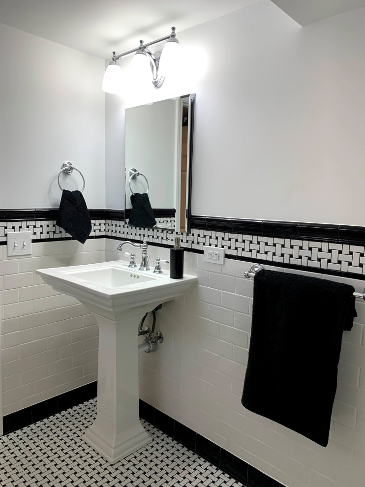 Inspiration for a mid-sized traditional 3/4 bathroom in Chicago with white cabinets, an alcove shower, a two-piece toilet, white tile, subway tile, grey walls, ceramic floors, a pedestal sink, white floor, a niche, a single vanity and a freestanding vanity.