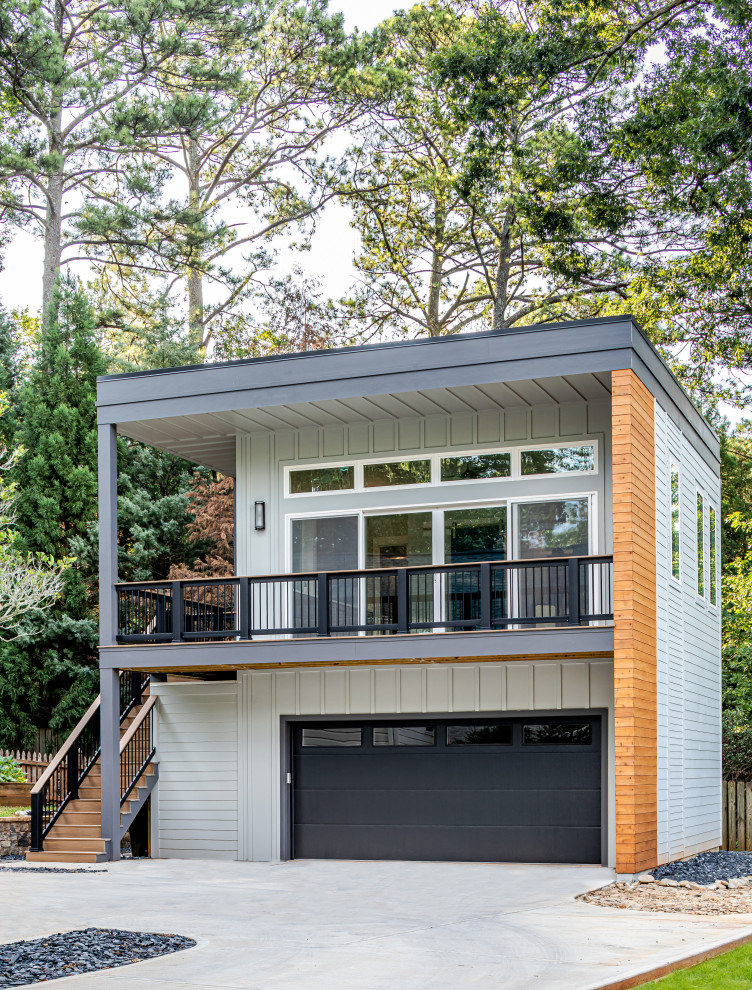 Large minimalist detached two-car garage workshop photo in Atlanta