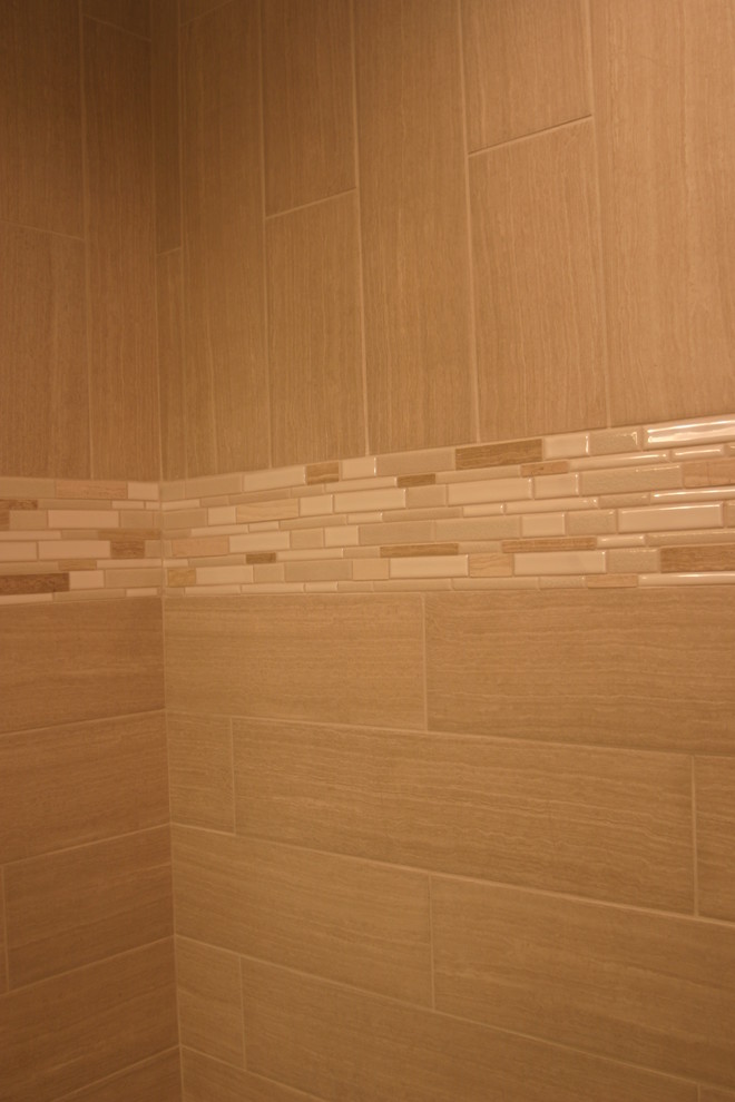 Example of a large transitional home design design