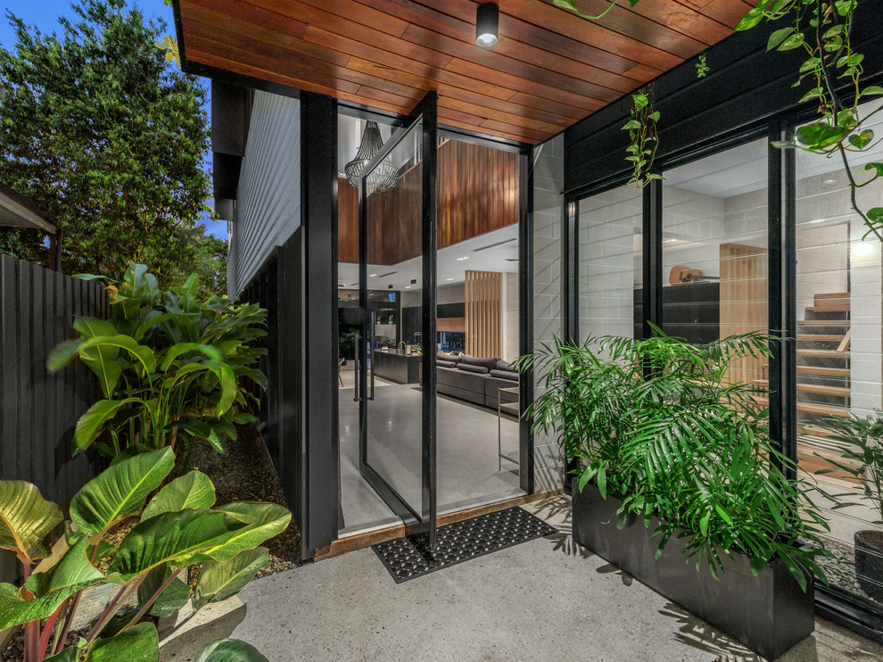 Photo of a tropical entryway in Brisbane.