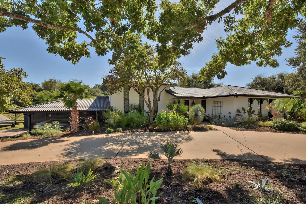 Transitional exterior home photo in Austin