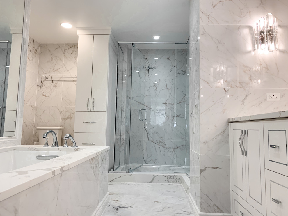 Small traditional master bathroom in Chicago with furniture-like cabinets, white cabinets, an undermount tub, a corner shower, a two-piece toilet, multi-coloured tile, marble, multi-coloured walls, marble floors, an undermount sink, engineered quartz benchtops, multi-coloured floor, a hinged shower door, multi-coloured benchtops, a shower seat, a double vanity and a built-in vanity.