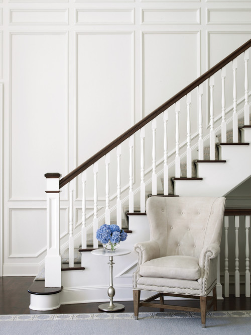 Design ideas for a traditional wood staircase in New York with painted wood risers.