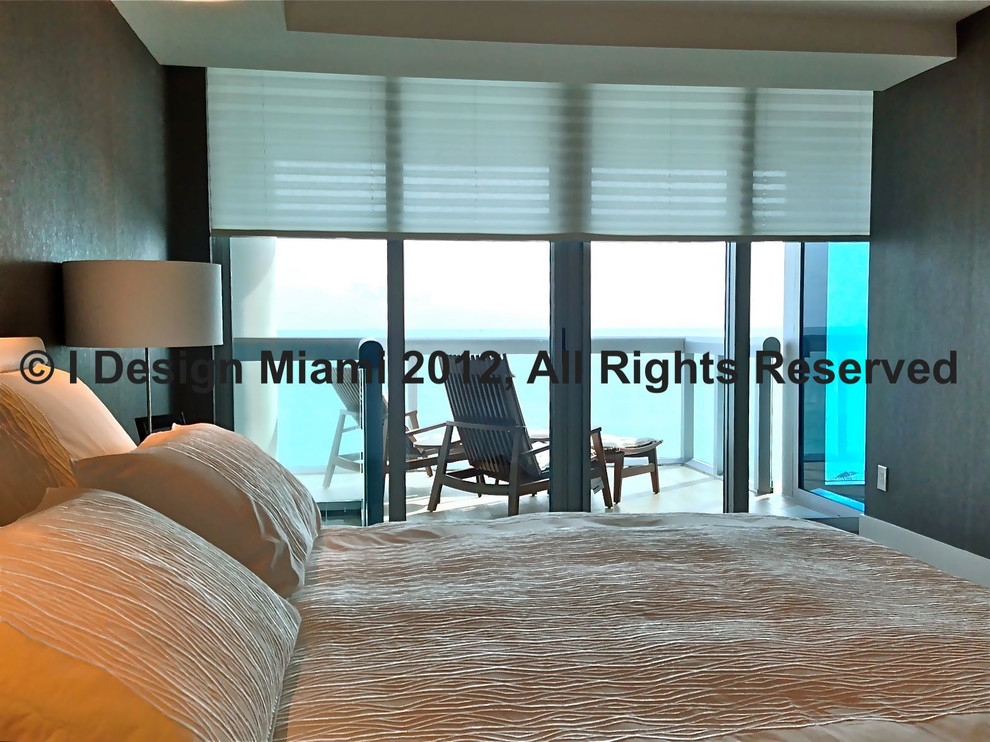 This is an example of a contemporary bedroom in Miami.