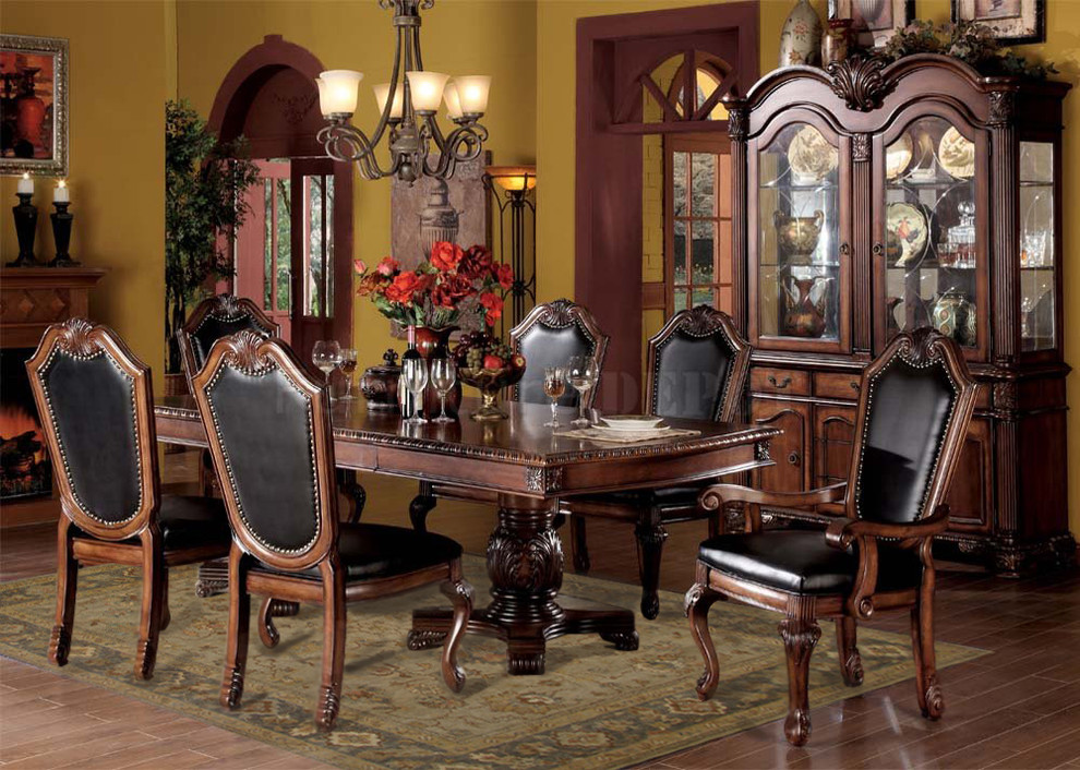 Inspiration for a large traditional separate dining room in Atlanta with yellow walls, dark hardwood floors, no fireplace and brown floor.