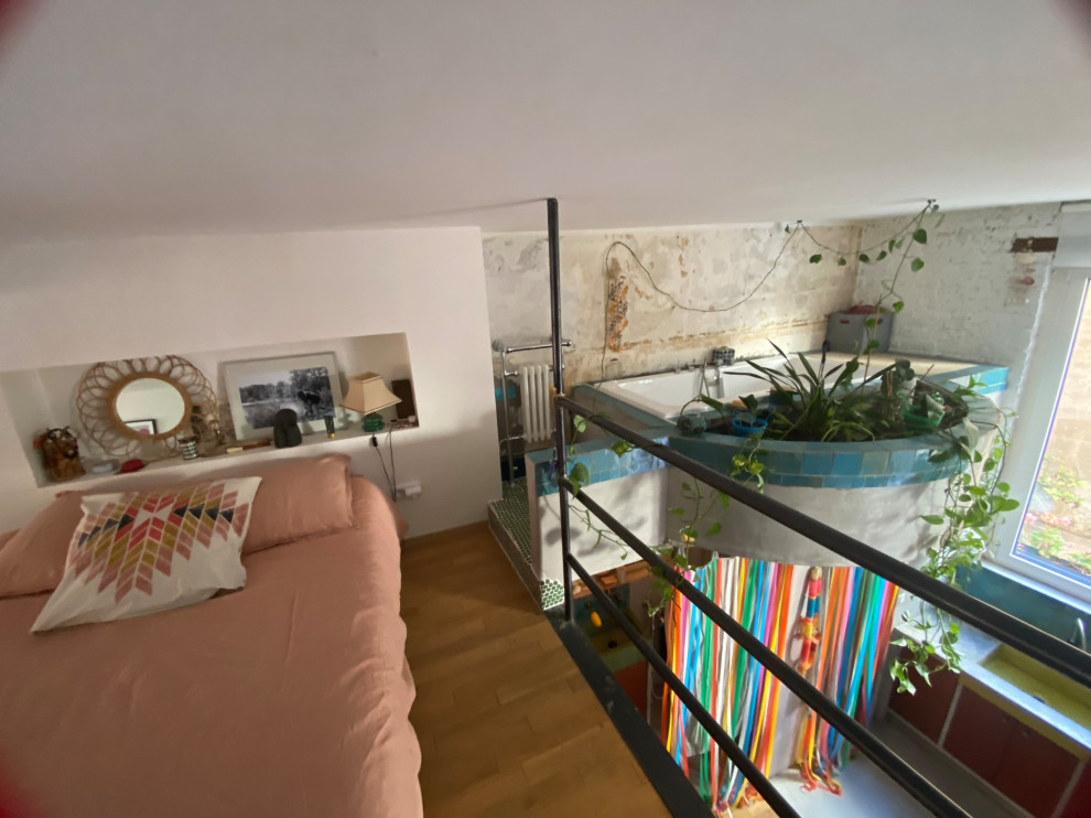 Transformation d'un local en loft brutaliste tropical