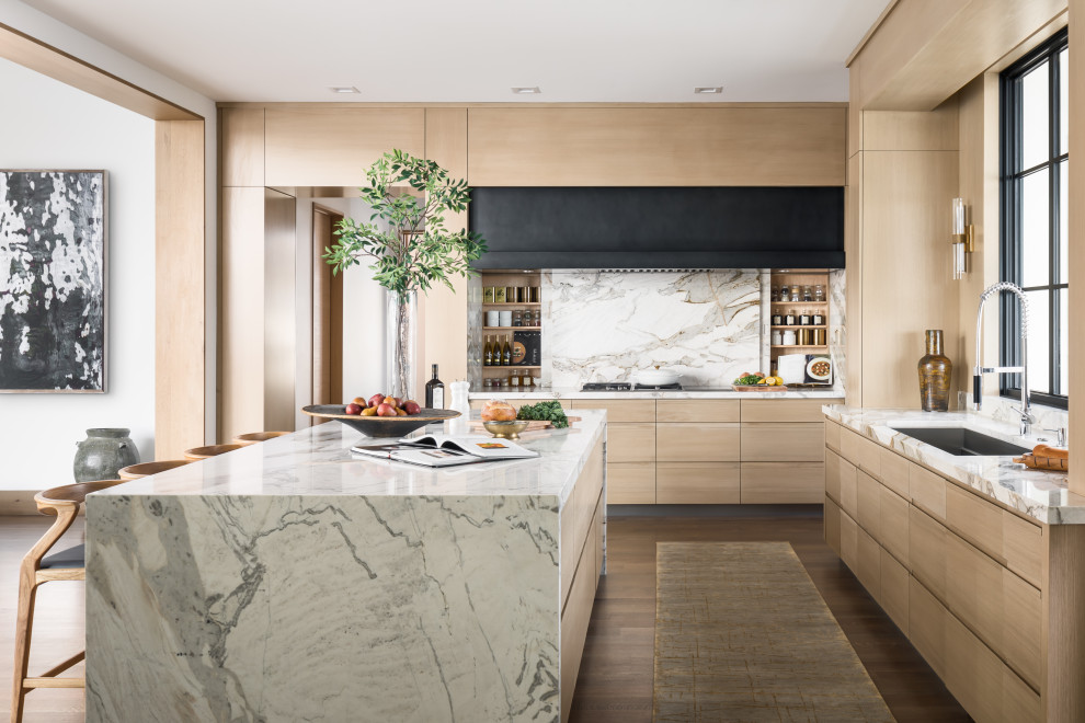 Inspiration for a contemporary kitchen in Kansas City with light wood cabinets, marble worktops, marble splashback and light hardwood flooring.