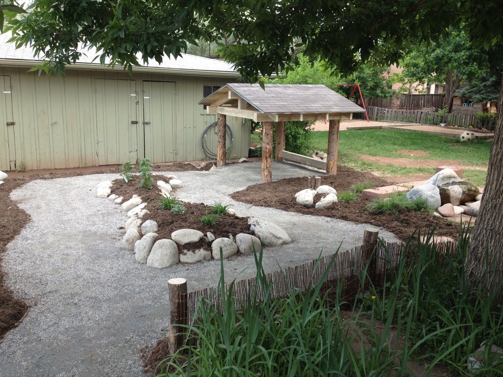 Inspiration for a rustic landscaping in Denver.